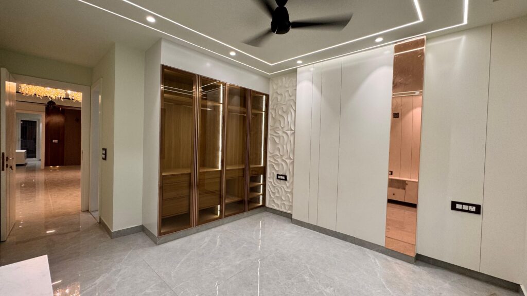 Modern bedroom wardrobe with glass doors