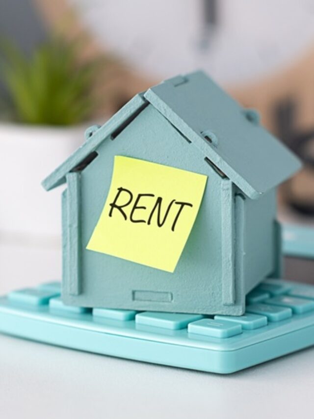 Model,House,Placed,On,Calculator,And,Sticker,Text,Rent.,The